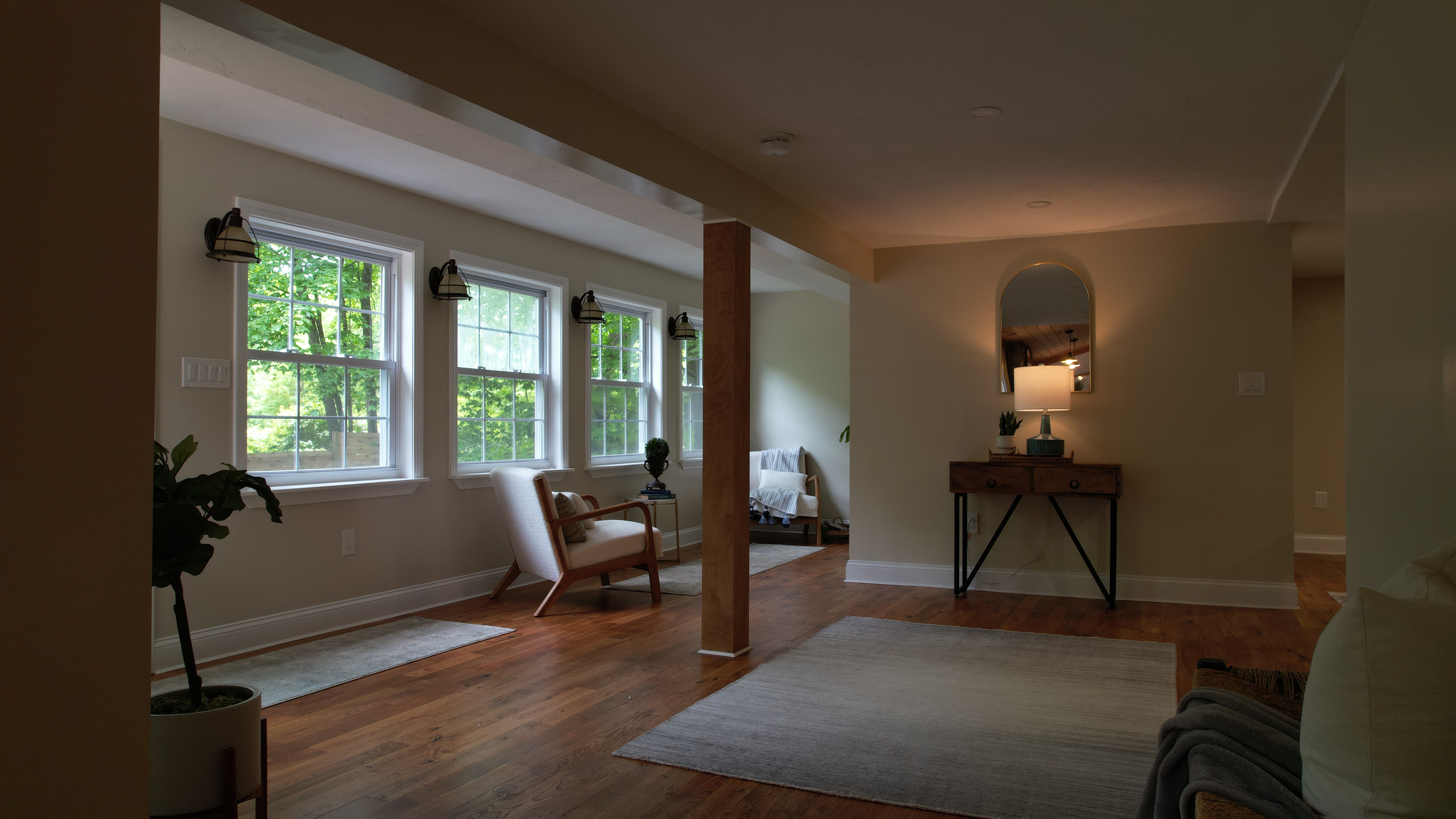 Framingham bright living area with wood flooring