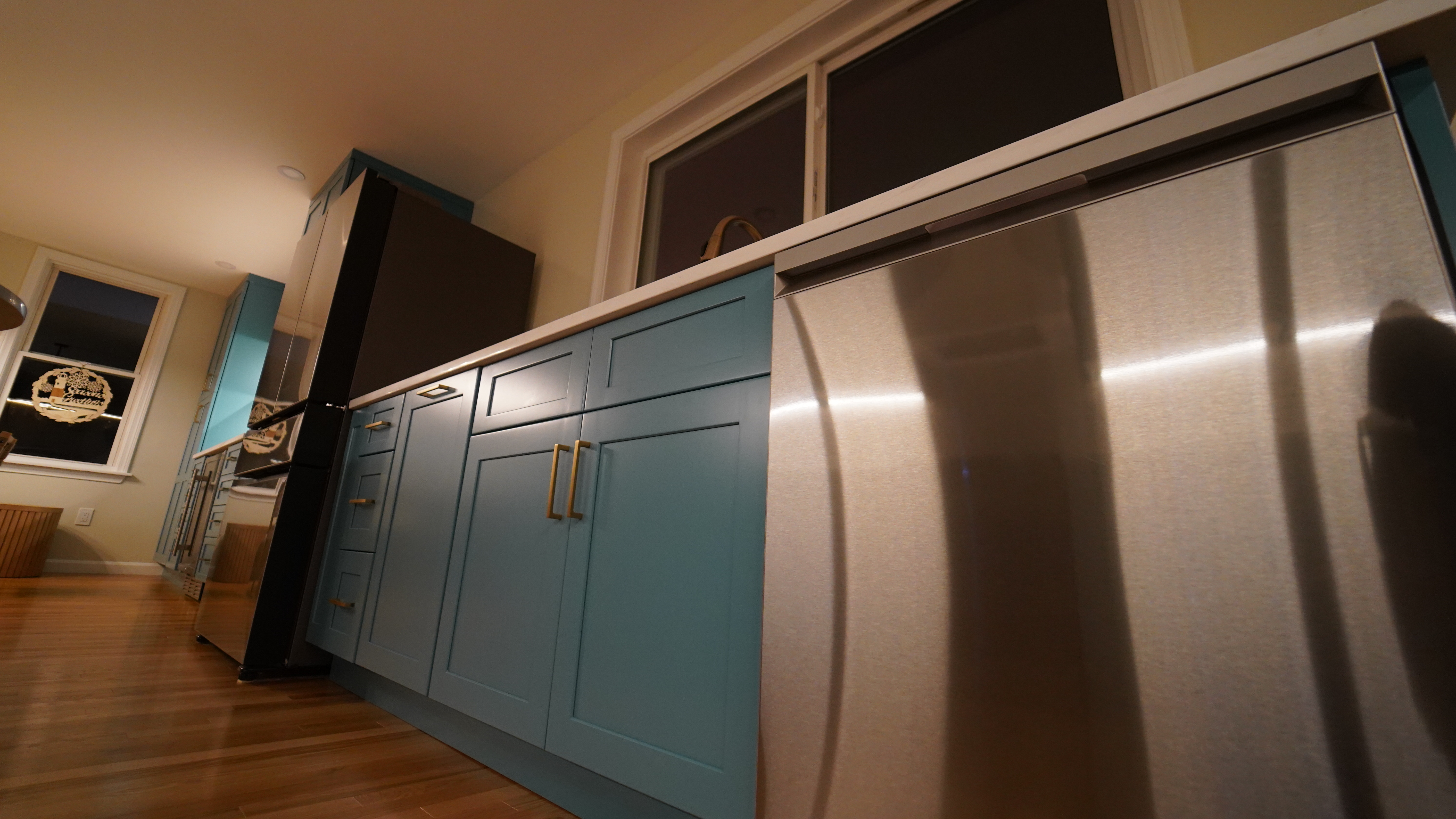 Chelsea blue cabinetry and stainless appliance detail
