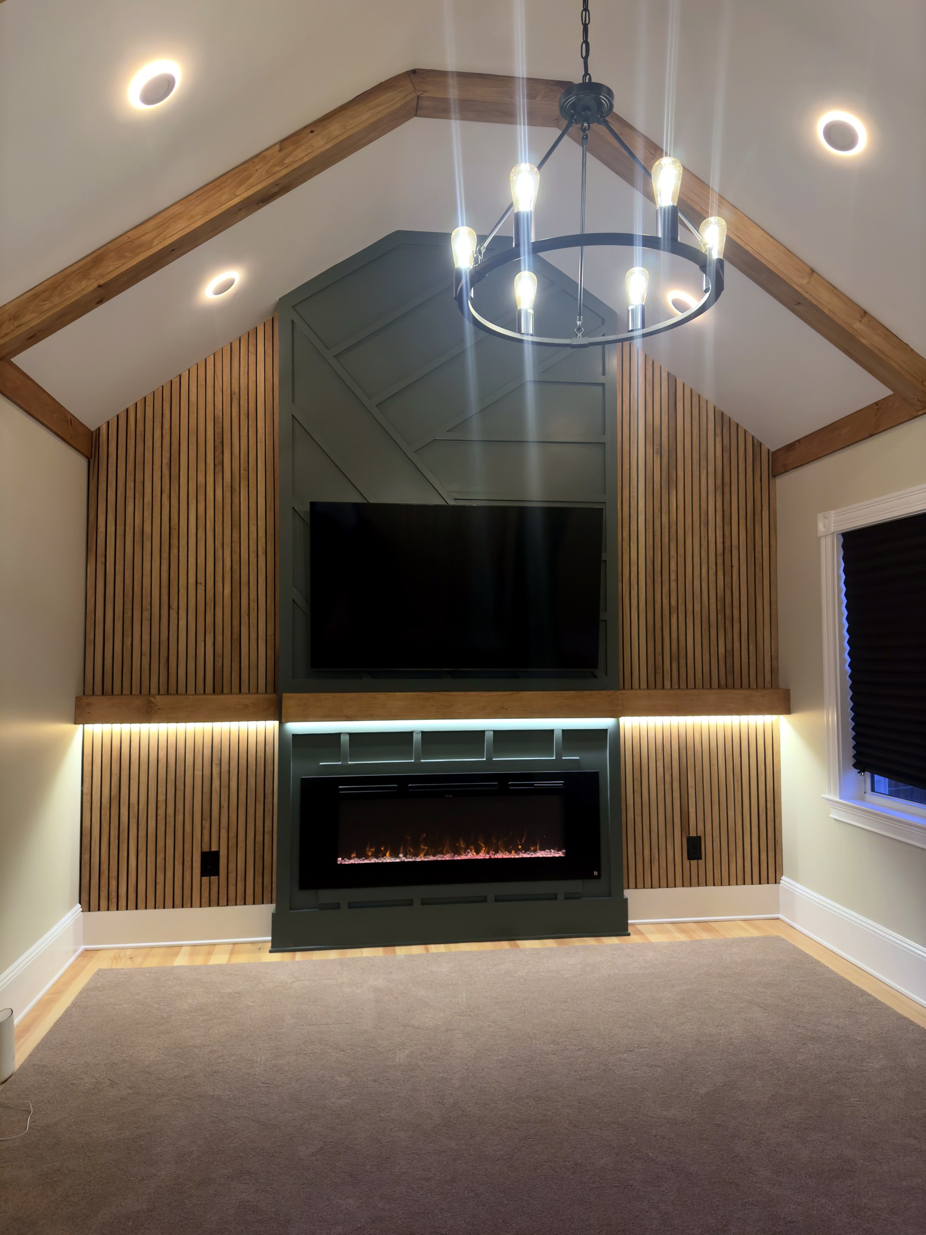 Milton finished primary suite feature wall and fireplace